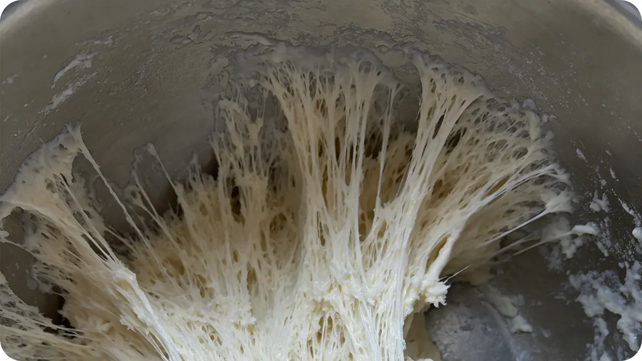 The dough sticks to the inner wall